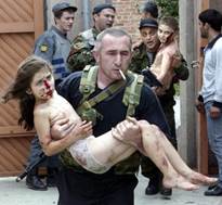 https://www.aasib.org/wp-content/uploads/2024/10/Elina_2004_Beslan-650x607.jpg