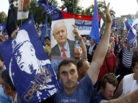Supporters of Serbian Radical Party holds posters of Milosevic and Mladic  during a protest against the arrest of Mladic in Belgrade | Luc MICHEL's  Transnational Action
