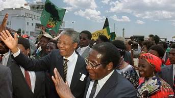http://news.bbcimg.co.uk/media/images/71574000/jpg/_71574491_mugabe_mandela.jpg