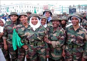 African women in the previous revolutionary armed forces of Libya under martyred leader Col. Muammar Gaddafi. Gaddafi and the Jamahiriya were overthrown in 2011 by an imperialist plot. by Pan-African News Wire File Photos