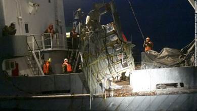 Wreckage from the Tu-154 plane is hauled from the Black Sea late on Monday, December 26.