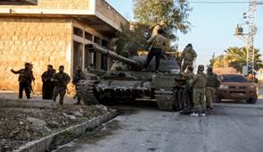 Syria rocked by surprise takeover of country's largest city of Aleppo : NPR