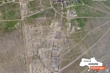 apparvero le immagini satellitari del campo delle forze armate russe vicino ai confini della Crimea